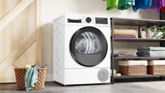 Сушильная машина Bosch WQG24500BY пан.англ. кл.энер.:A++ макс.загр.:9кг белый