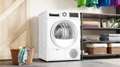 Сушильная машина Bosch Serie 6 WQG242AASN пан.англ. кл.энер.:A++ макс.загр.:9кг белый