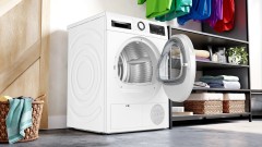Сушильная машина Bosch Serie 6 WQG242AASN пан.англ. кл.энер.:A++ макс.загр.:9кг белый