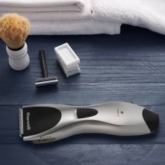 Машинка для стрижки Maxwell MW-2103 серебристый (насадок в компл:1шт)